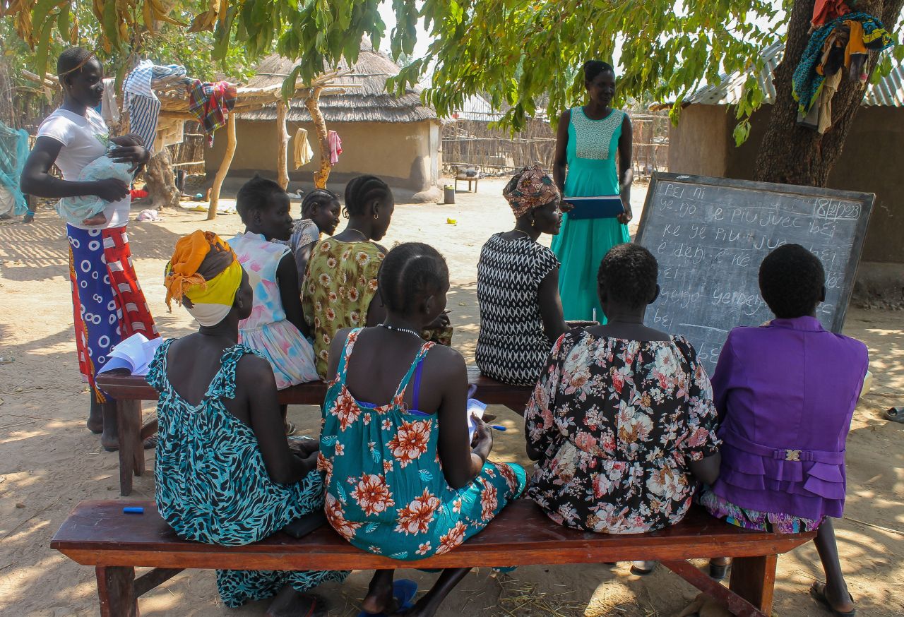 Martha Aling conducting a FAL class in Nyumanzi